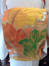 画像: オレンジに植物柄の袋帯